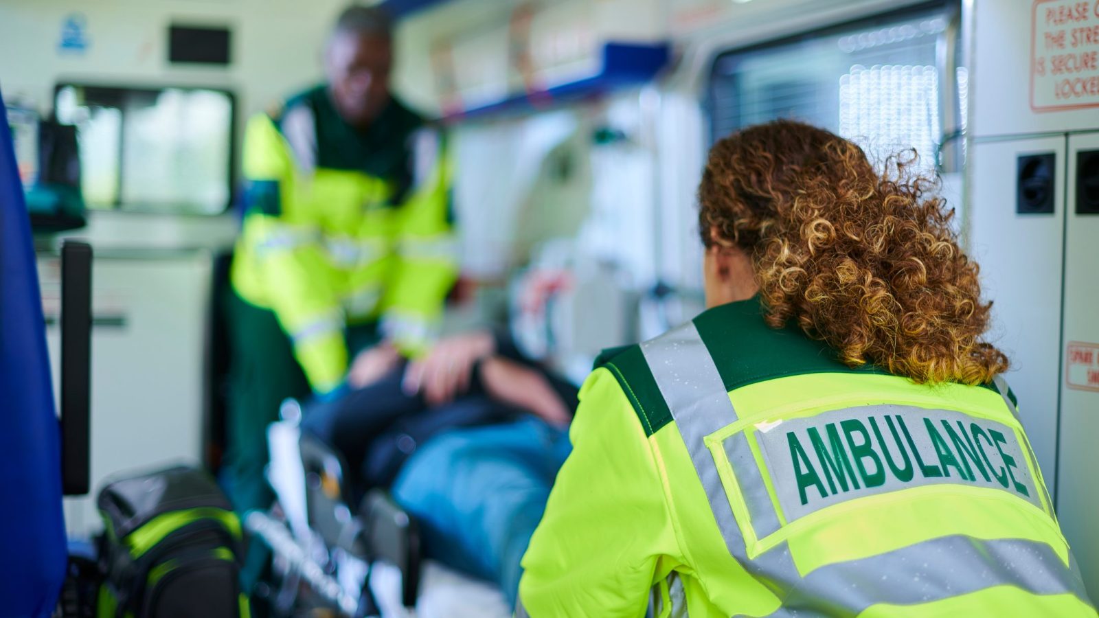 Paramedics treating a patient