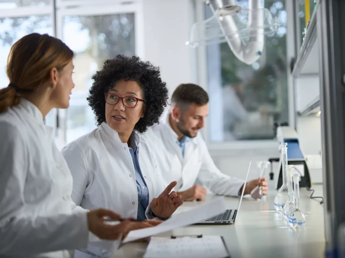 The development of new medical treatments for infectious diseases. Image: scientists working in a lab.